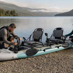 Two paddlers preparing the Drift Duo 420 kayak at the lakeside