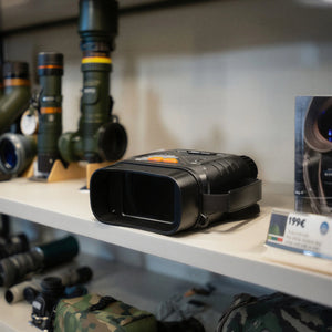 4K night vision binoculars displayed in a store