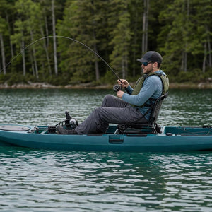 Angler pedal fishing on the compact kayak