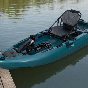 Compact pedal fishing kayak by a dock showing the rudder