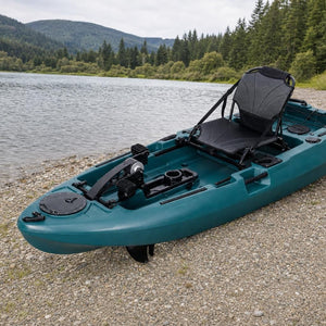 Compact pedal fishing kayak at the shoreline