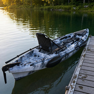 Heron 10 kayak beside a dock showing the rudder
