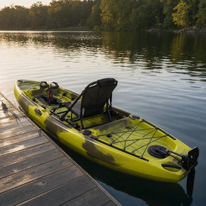 Pedal fishing kayak by a dock showing the rudder