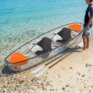 Transparent kayak at the shore