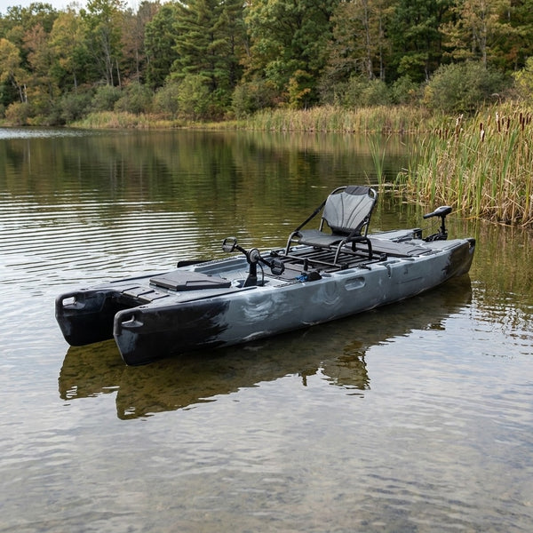 Twin-hull catamaran fishing kayak on calm water