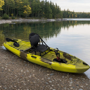 Pedal fishing kayak at the shoreline